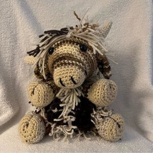 Handcrafted Brown and Beige Crochet highland cow.